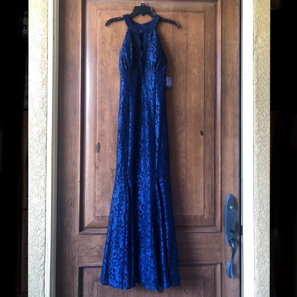 Navy blue sequin gown (Macys). New, never worn. Scalloped neckline. Size 8